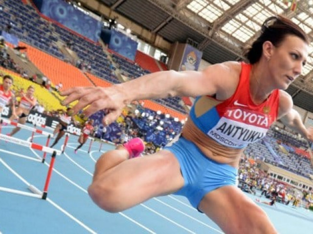 How did two Russian Olympic champions get rid of being stripped of their gold medals?
