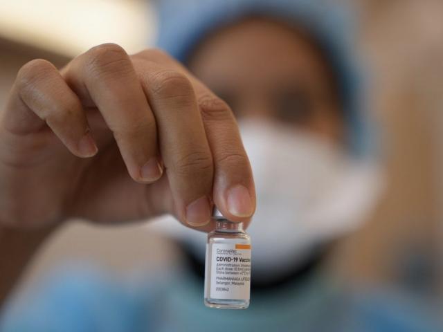 Vì sao quan chức y tế TQ hối thúc WHO bỏ giai đoạn cuối thử nghiệm vắc-xin Covid-19?